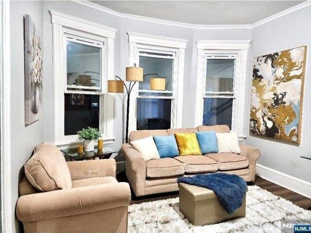 House for sale in Elm Park Village, East Orange