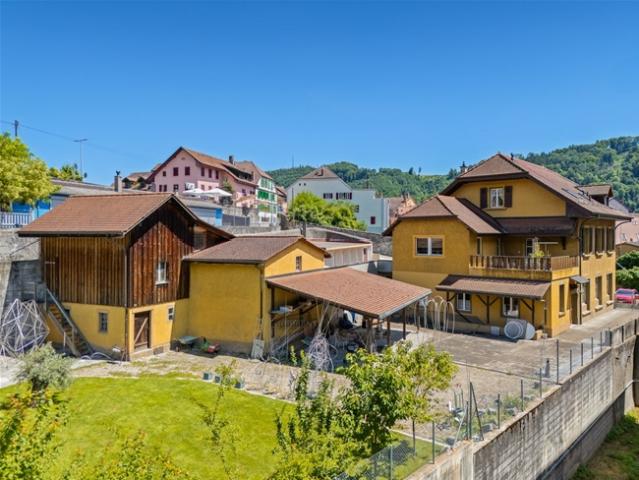 Einfamilienhaus kaufen in Moudon, Waadt