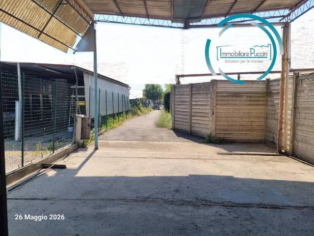 Locale Commerciale in vendita a San Donnino, Campi Bisenzio
