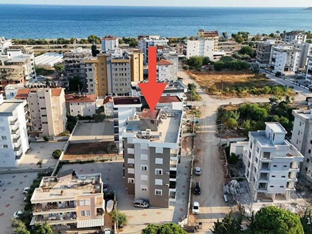 Kum, Finike içerisinde satılık mülk