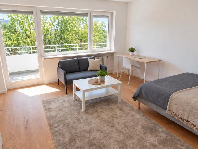 Dachgeschosswohnung kaufen in Trudering-Riem, München