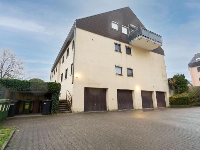 Dachgeschosswohnung kaufen in Schwöllbronn, Öhringen