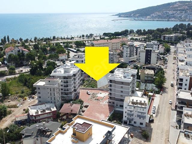Kum, Finike içerisinde satılık mülk