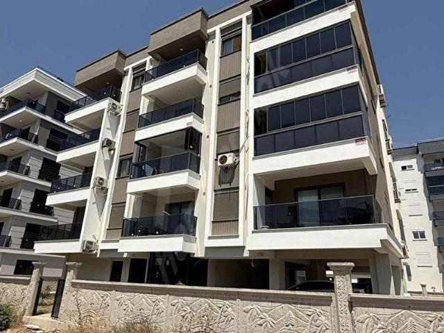 Kum, Finike içerisinde satılık mülk
