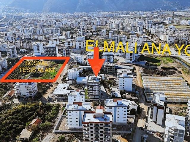 Kum, Finike içerisinde satılık mülk