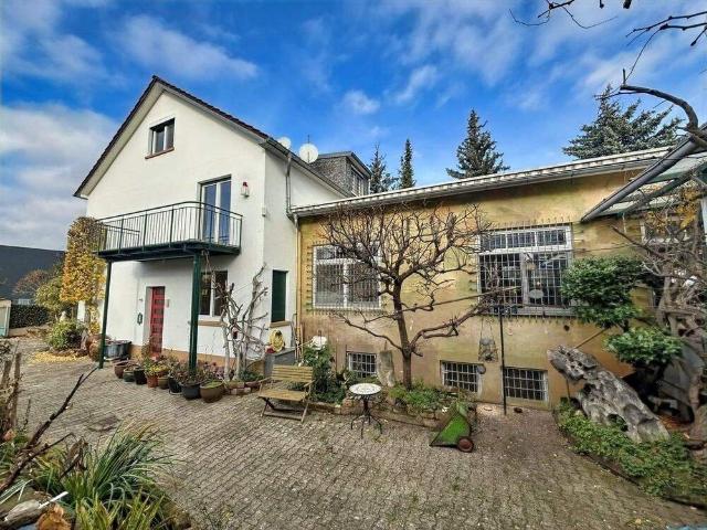 Haus kaufen in Neuostheim/Neuhermsheim, Mannheim