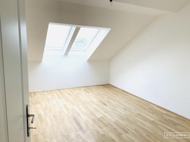 Dachgeschosswohnung kaufen in Liesing, Wien