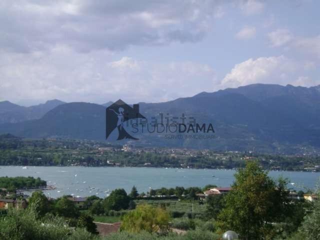 Locale Commerciale in vendita a Cisano, San Felice Del Benaco