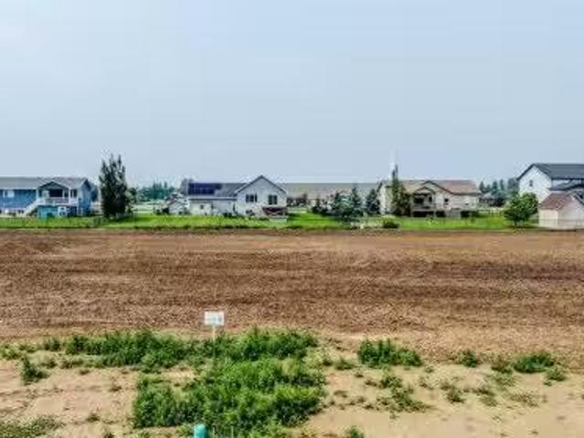 House for sale in Raymond, Alberta