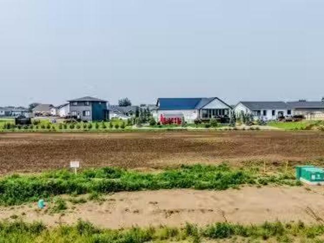 House for sale in Raymond, Alberta