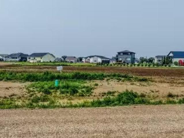 House for sale in Raymond, Alberta