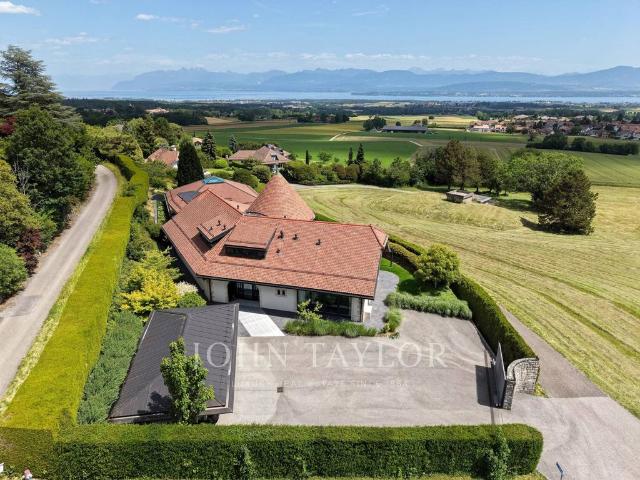Einfamilienhaus kaufen in Givrins, Waadt