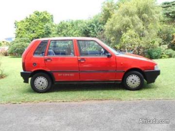 Fiat uno 1993 fiat uno red 1100 fire 4 door good condition Fiat uno 1993 fiat uno red 1100 fire 4 door good condition