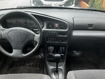 Mazda 323 selling white mazda 323 1997 in noveleta Mazda 323 selling white mazda 323 1997 in noveleta