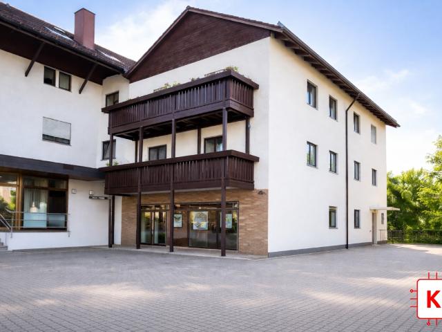 Mehrfamilienhaus kaufen in Olching