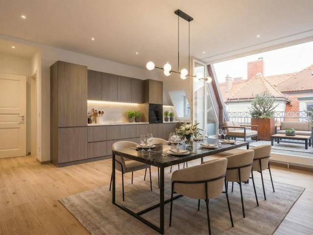 Dachgeschosswohnung kaufen in München, Bayern