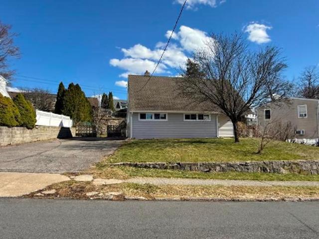 House for sale in Glenwood, New York