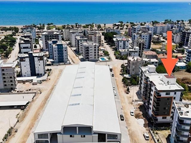 Kum, Finike içerisinde satılık mülk