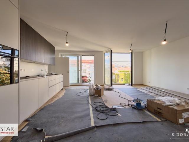 Dachgeschosswohnung kaufen in Wien