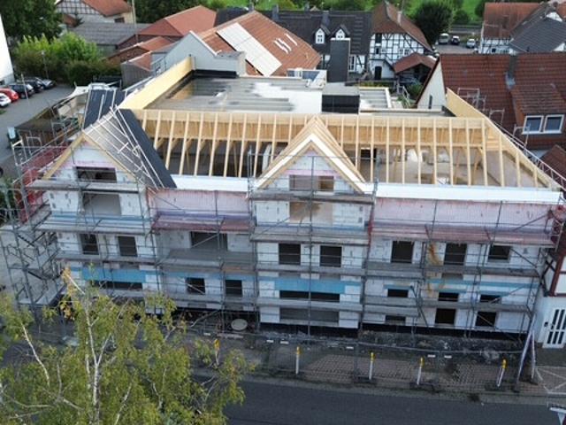 Dachgeschosswohnung kaufen in Körle, Hessen