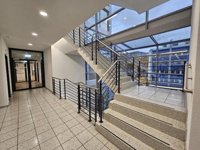 Büro kaufen in Einigen, Zürich