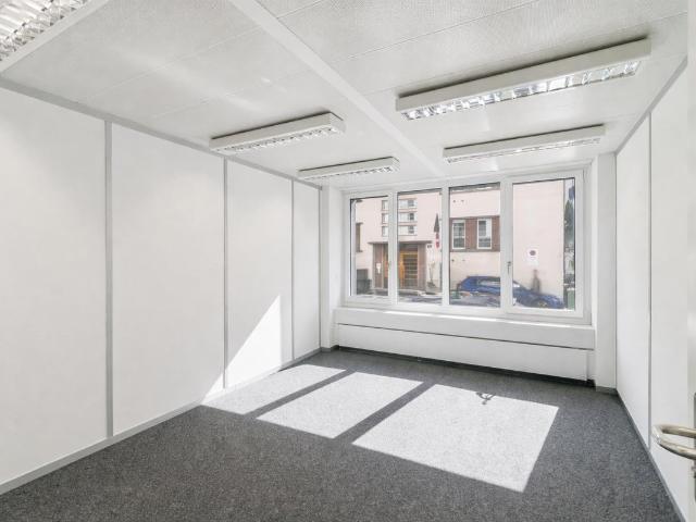 Büro kaufen in Einigen, Zürich