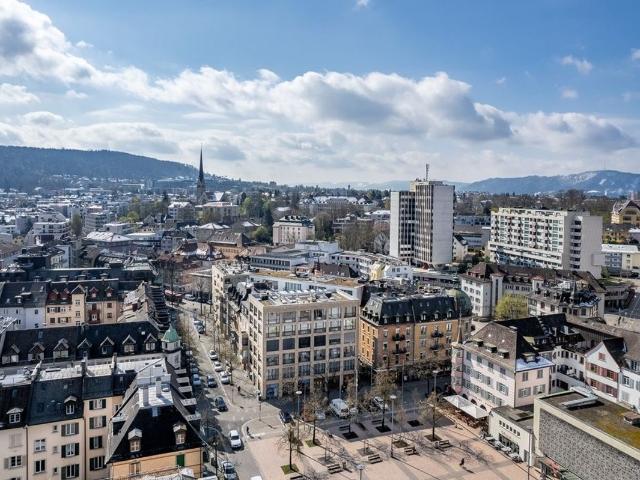 Büro kaufen in Einigen, Zürich