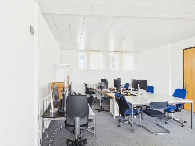 Büro kaufen in Einigen, Zürich