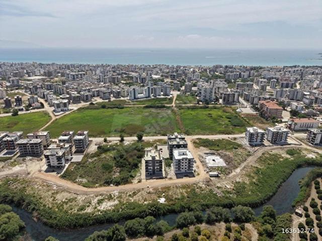 Kum, Finike içerisinde satılık mülk