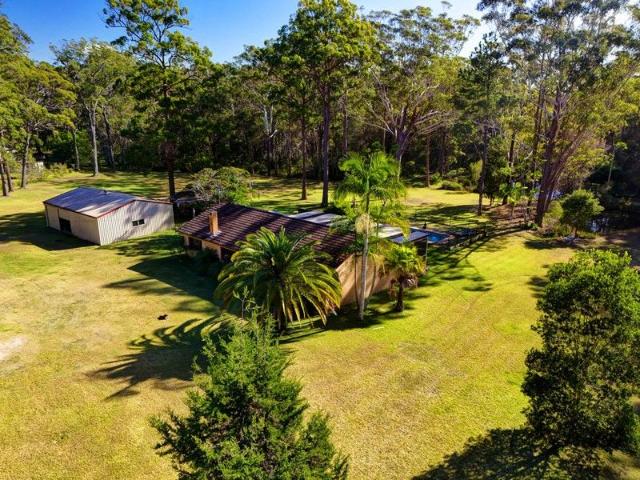 Cottage for sale in Coomba Bay, New South Wales