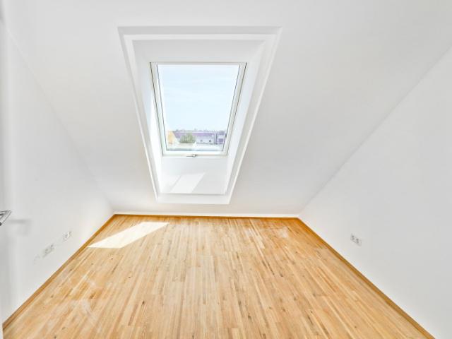 Dachgeschosswohnung kaufen in Donaustadt, Wien