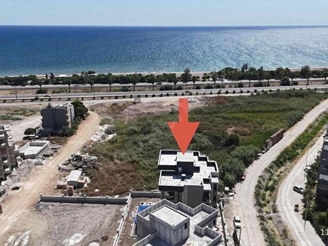 Kum, Finike içerisinde satılık mülk