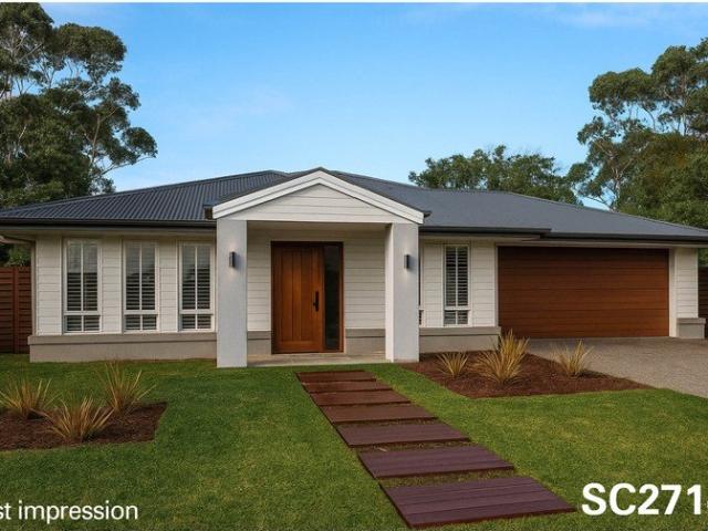 Cottage for sale in Lake Cathie, New South Wales