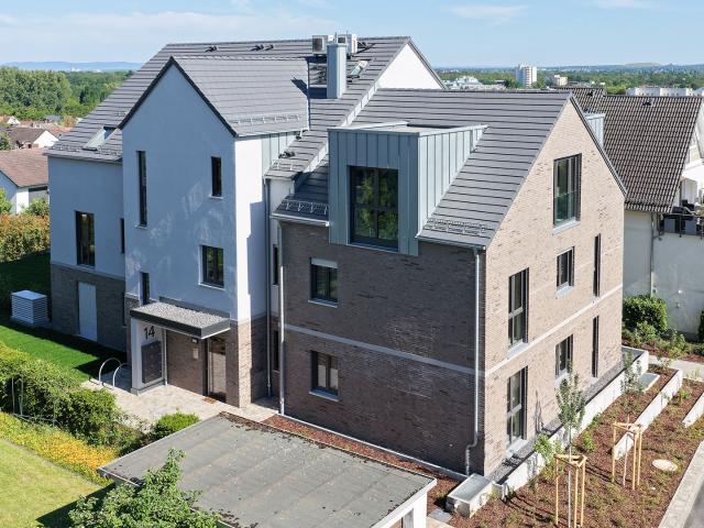 Dachgeschosswohnung kaufen in Bergen-Enkheim, Sachsenhausen