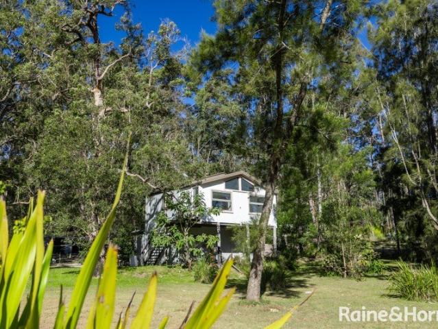 Cottage for sale in Lake Conjola, New South Wales