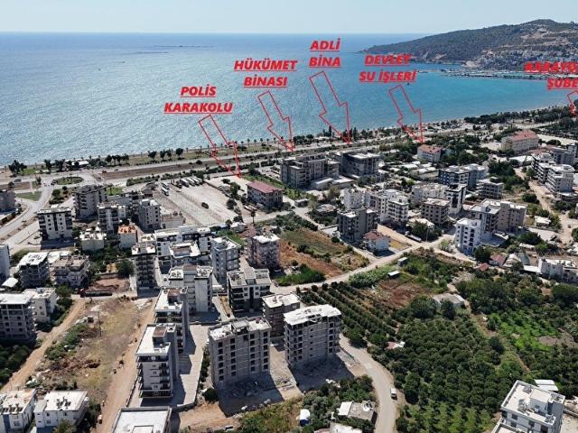 Kum, Finike içerisinde satılık mülk