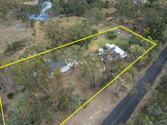 Cottage for sale in Pierces Creek, Queensland