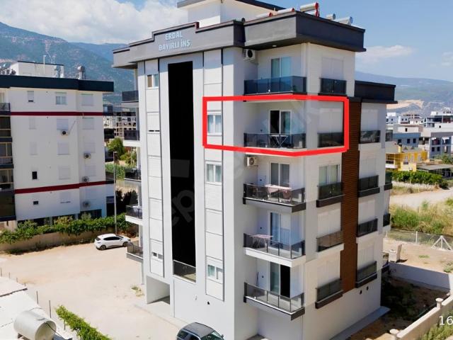 Kum, Finike içerisinde satılık mülk