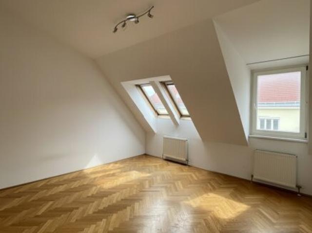 Dachgeschosswohnung kaufen in Wien