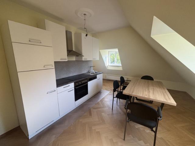 Dachgeschosswohnung kaufen in Simmering, Wien