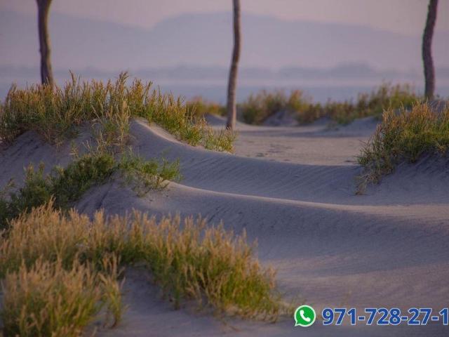 terreno en venta cercano a la playa y el mar en playa azul