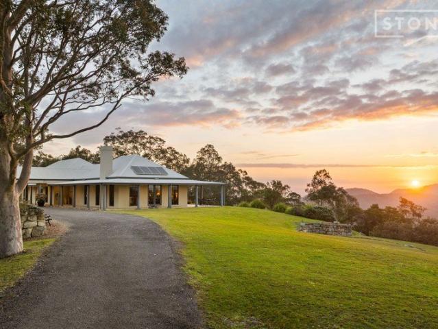Cottage for sale in Glendon Brook, New South Wales