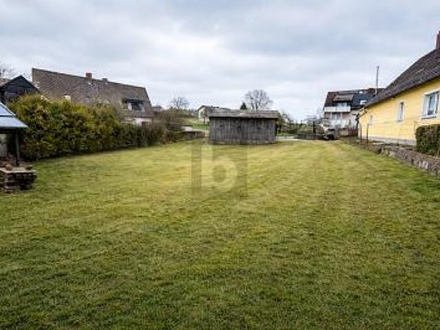Erdgeschosswohnung kaufen in Speichersdorf, Bayern