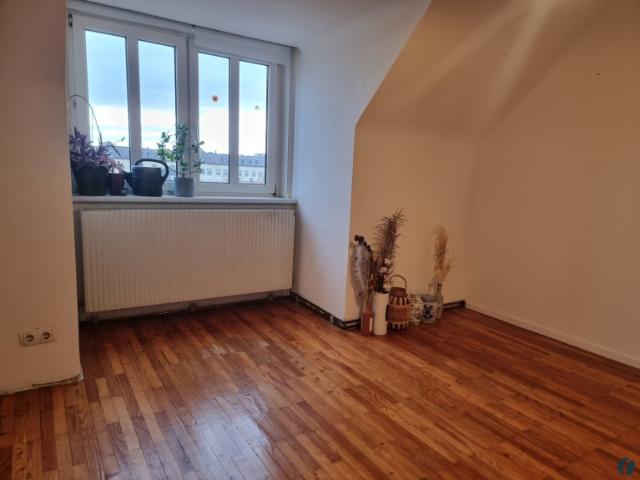 Dachgeschosswohnung kaufen in Baden