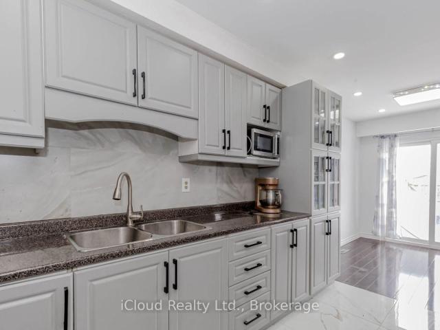 Condo for sale in Woburn, Ontario