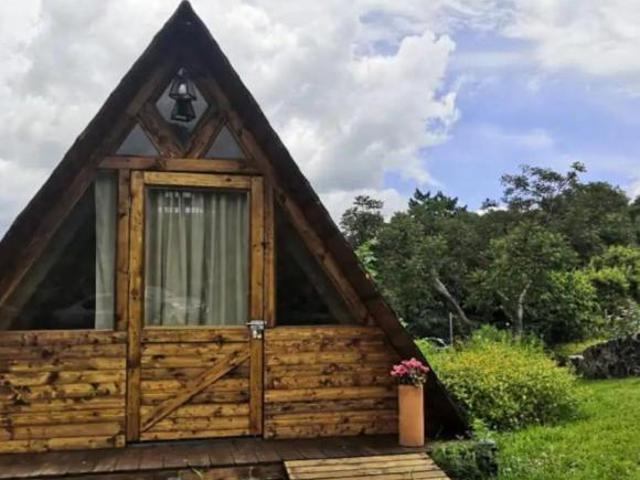 VENTA DE TERRENO 709 M2 CON TRES HERMOSAS CABAÑAS