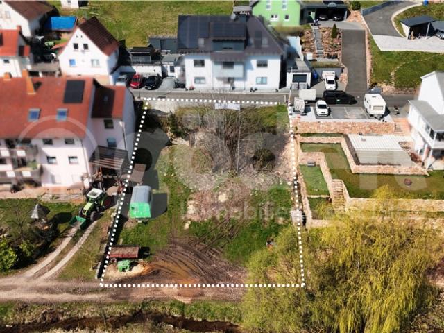 Erdgeschosswohnung kaufen in Mespelbrunn, Bayern