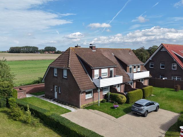Mehrfamilienhaus kaufen in Hattersum, Wittmund