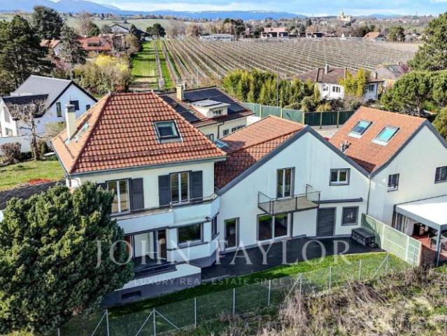 Haus kaufen in Tolochenaz, Waadt
