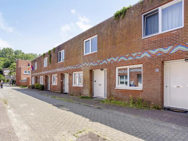 Eengezinswoning te koop in Amsterdam, Noord